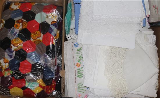 A quantity of mixed linens and a patchwork quilt